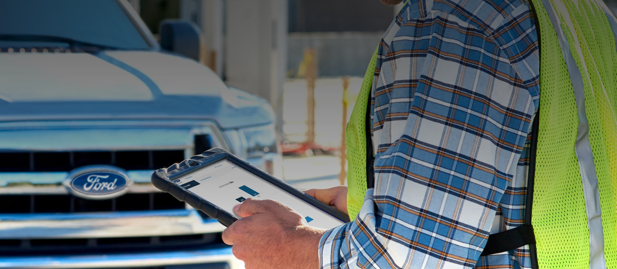 Man looking at tablet